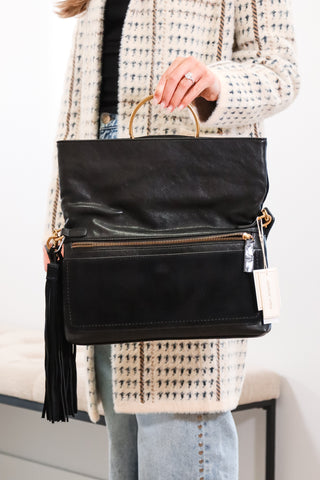 purse, clutch bags, black purse, black clutch bag, black and gold purse, dolce vita purse, black dolce vita purse, dolce vita clutch, black dolce vita clutch