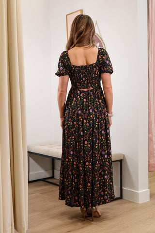 Floral maxi dress, V neckline, black base, puffy sleeves, with pockets, lower back cutout