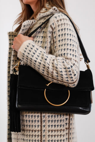 purse, clutch bags, black purse, black clutch bag, black and gold purse, dolce vita purse, black dolce vita purse, dolce vita clutch, black dolce vita clutch