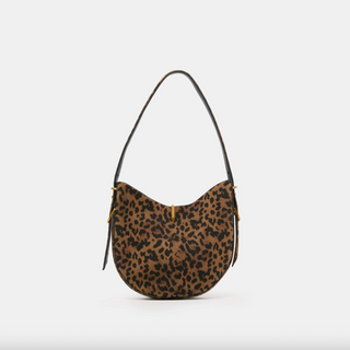 Leopard print handbag on a light gray background