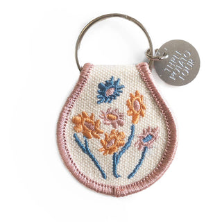 Light pink and white floral embroidered keychain