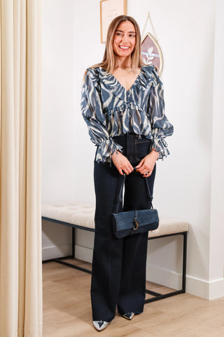 Mary Grace is 5’3” wearing a size XS with a 32B bust, 25” waist and 36” hip&nbsp;