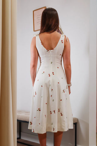 midi strawberry dress, strawberry dress, white dress wither strawberries on it, picnic dress, spring dress, graduations dress inspo, white dress with tie straps 