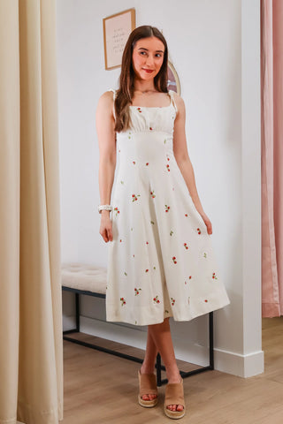 midi strawberry dress, strawberry dress, white dress wither strawberries on it, picnic dress, spring dress, graduations dress inspo, white dress with tie straps 